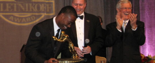 Foundation Chairman Ritchie Pickron presents 2013 Biletnikoff Award winner Brandin Cooks the most beautiful (and heaviest) trophy in college sports, while keynoter Dick Vermeil assists.